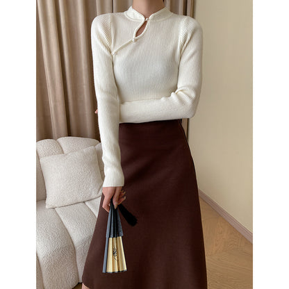 "Chic Slim Fit Knitwear with Stand-Up Collar and Elegant Buckle Detail"